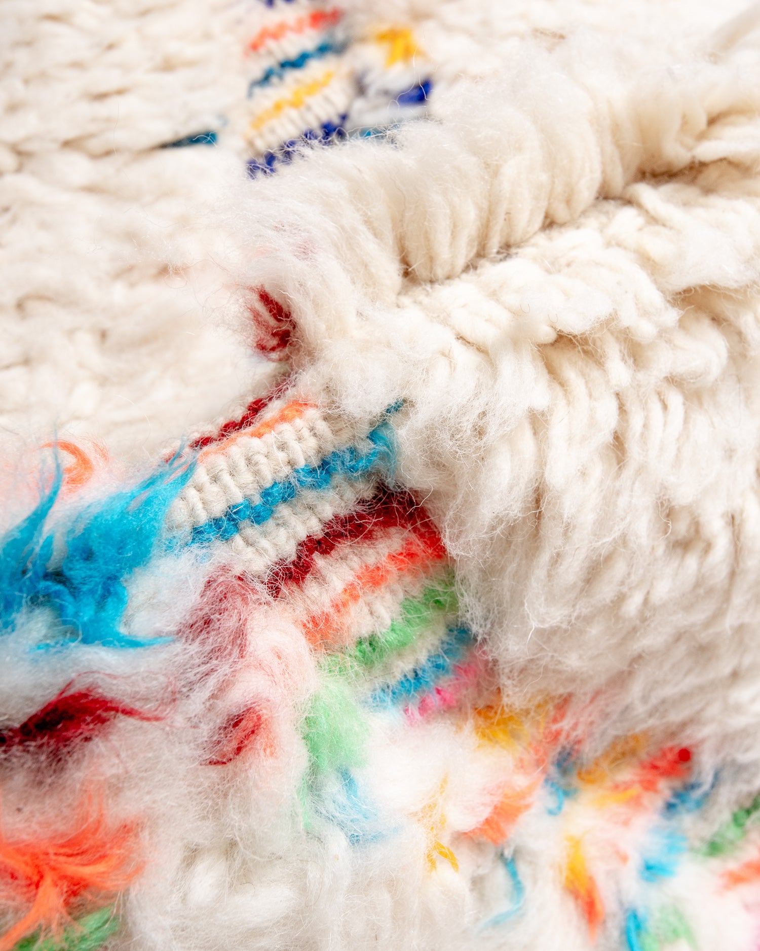 Modern, designer, handcrafted Berber rug from Morocco. Beniourain carpet with beautiful colours and patterns and fluffy wool texture.